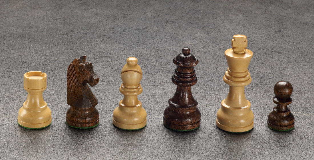 Chess pieces in acacia/boxwood, KH 75mm, leaded