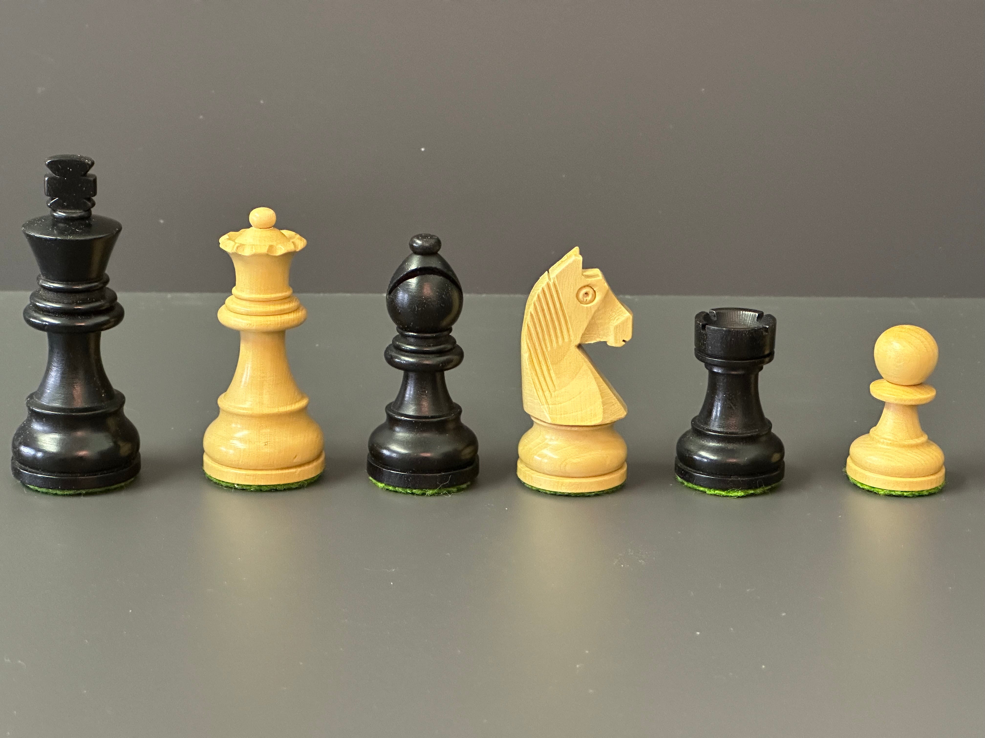 Chess pieces in black/boxwood, KH 95mm, leaded