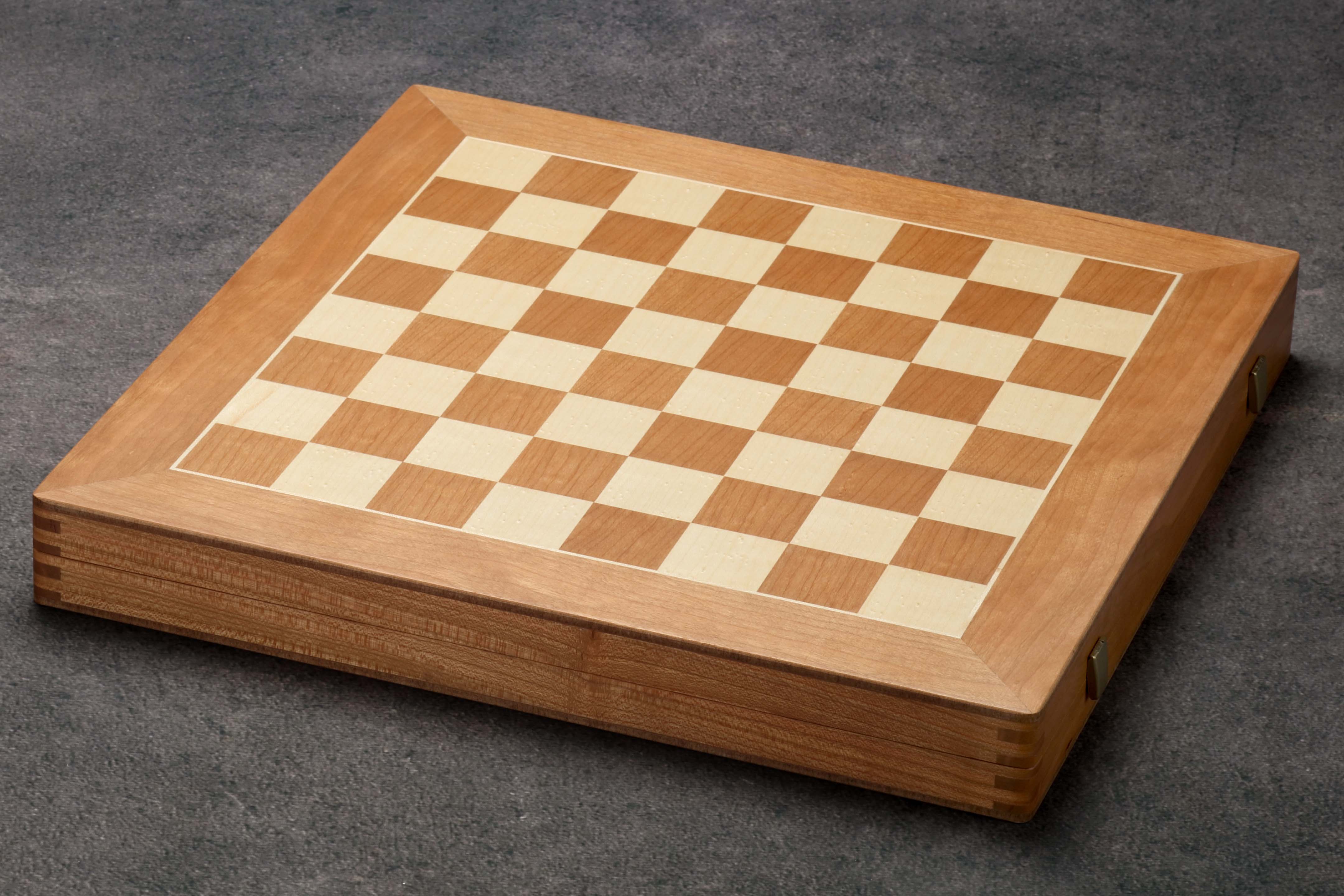 Large cherry wood game collection with chess, checkers, mill, and backgammon