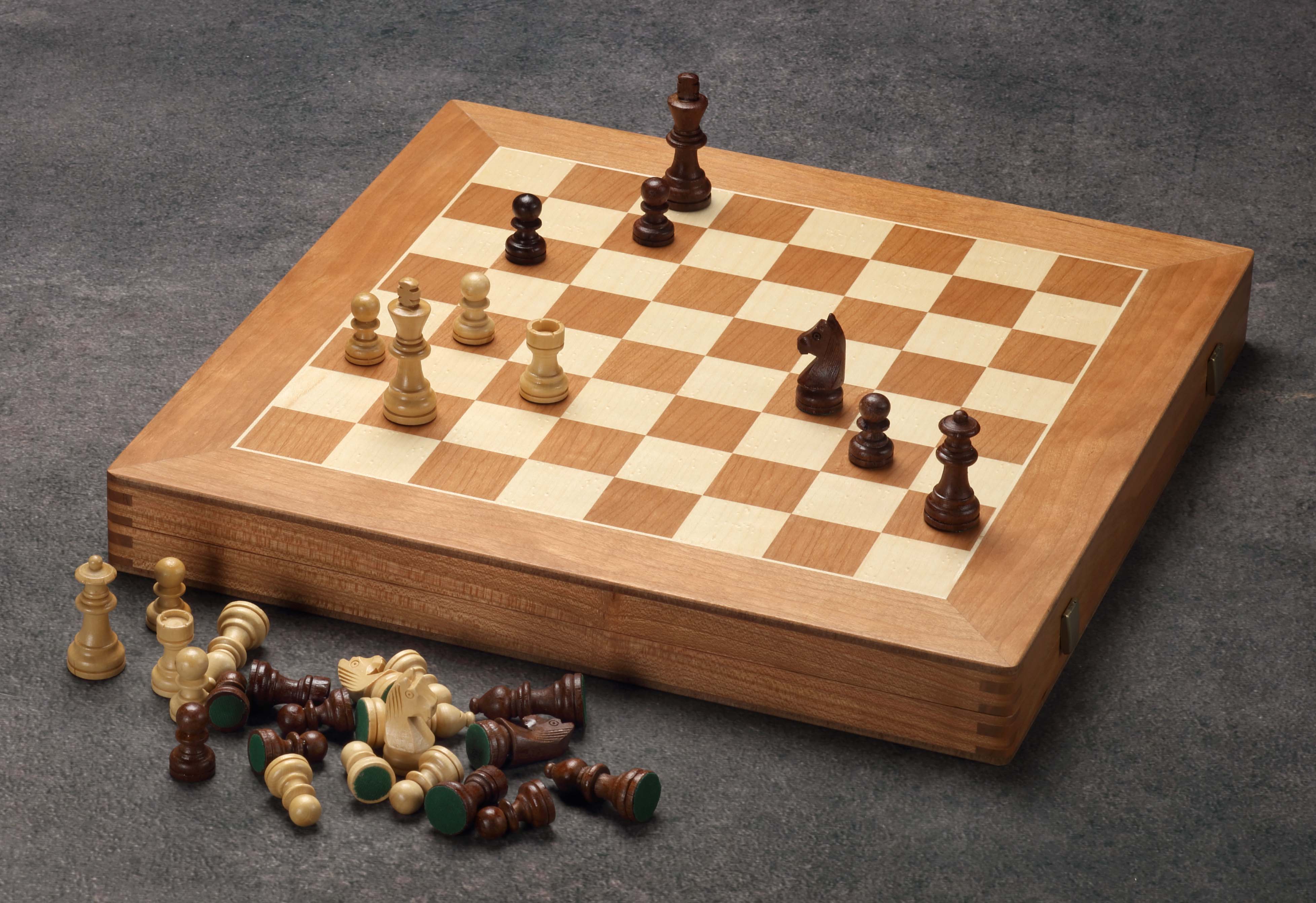 Large cherry wood game collection with chess, checkers, mill, and backgammon