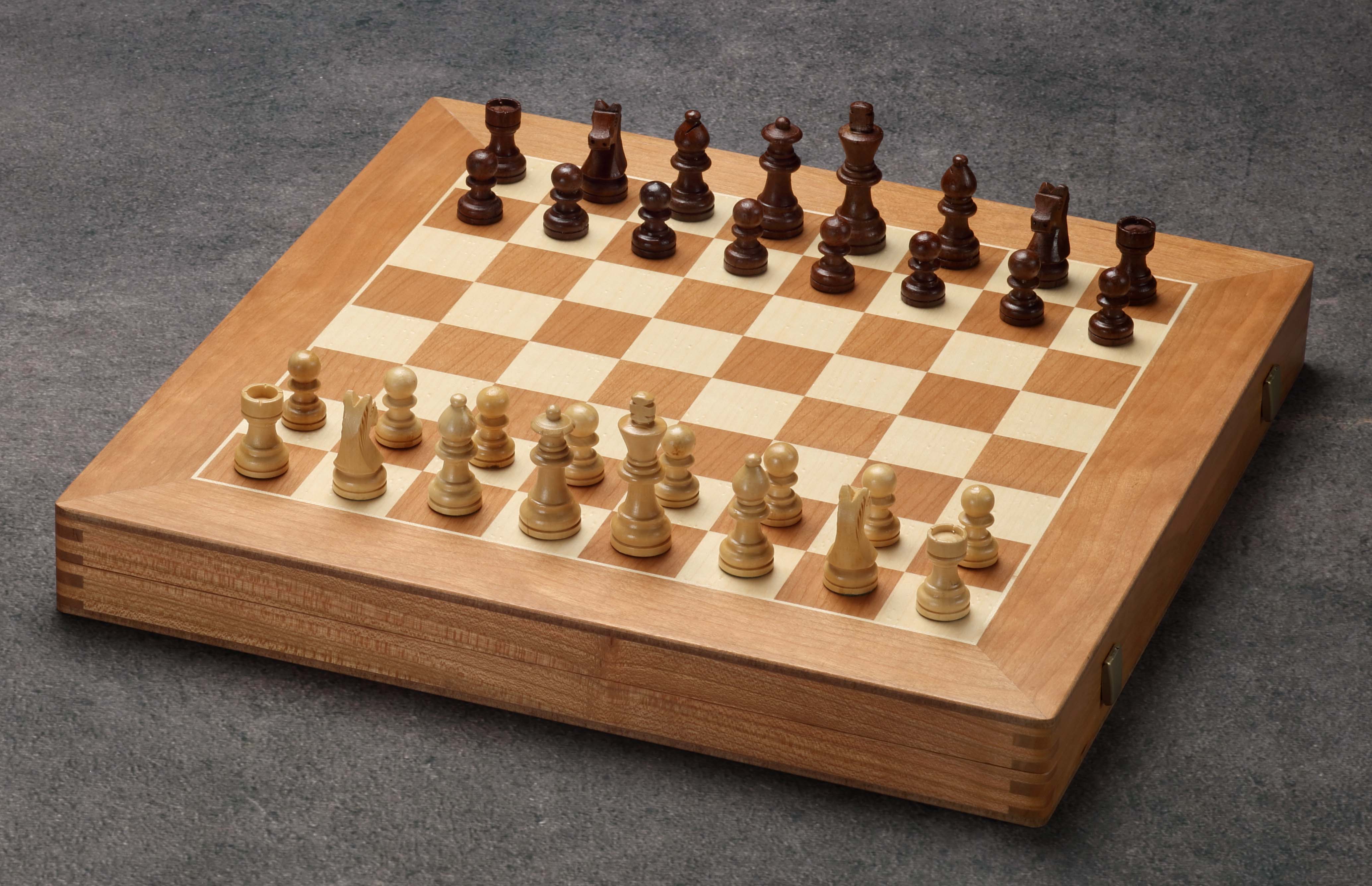 Large cherry wood game collection with chess, checkers, mill, and backgammon